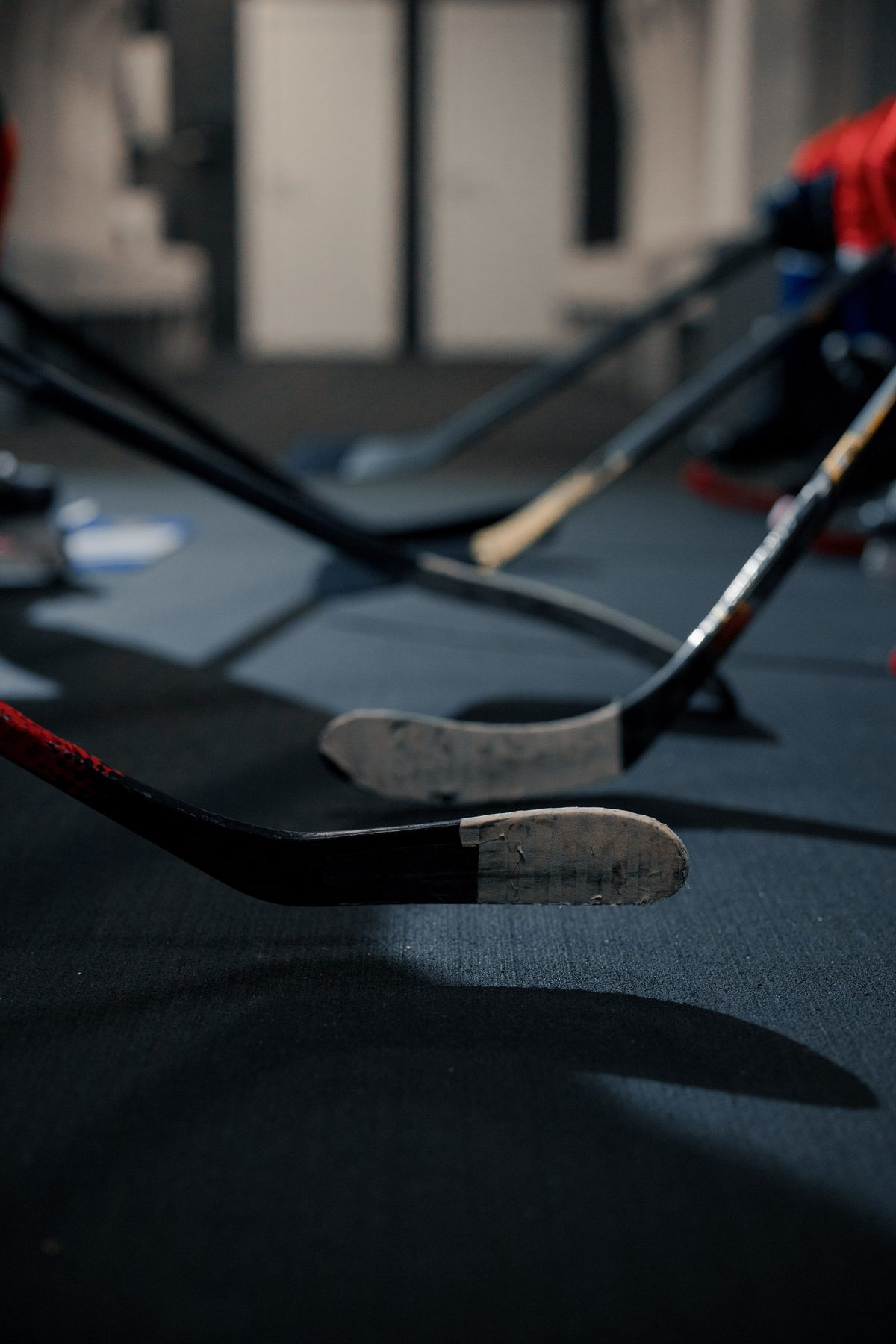 Sticks laid out on the room floor before a game
